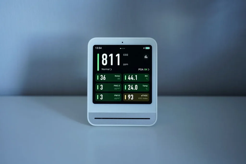 A digital hygrometer displaying an indoor relative humidity reading in a home