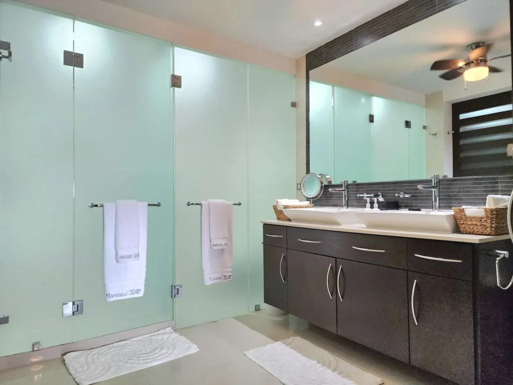 Ceiling exhaust fan in a bathroom used to vent moisture outside