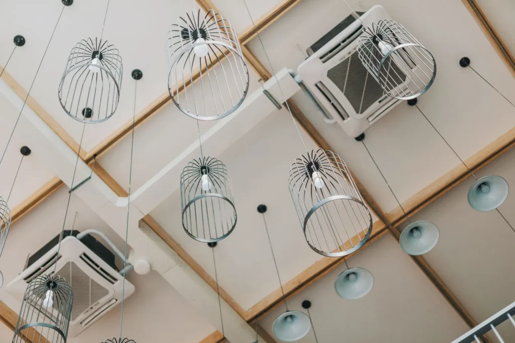 A ceiling transfer grille that lets trapped bedroom air escape to a hallway