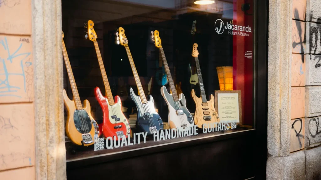 A small digital hygrometer reading 48 percent inside an open guitar case