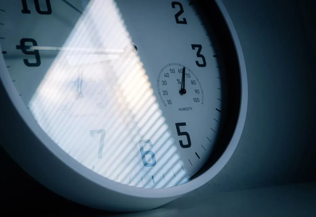 A digital hygrometer displaying indoor relative humidity to diagnose ventilation problems